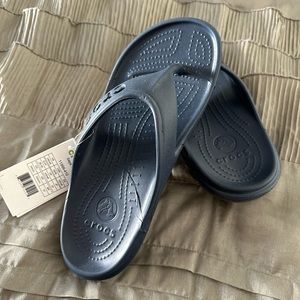 Croc’s sandal. Never worn, navy blue. Women size 8, Men’s size 6